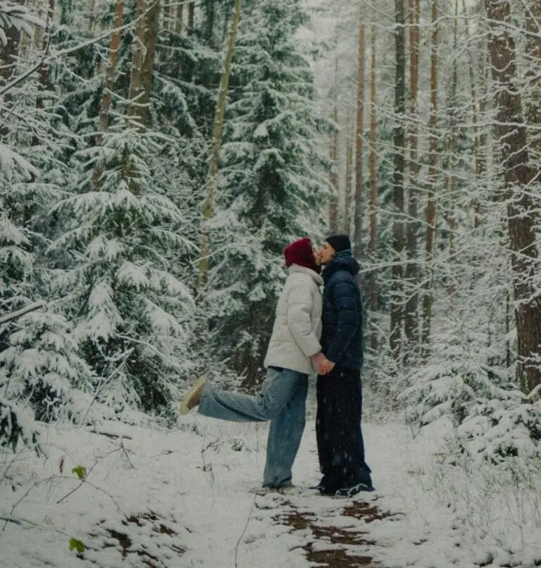best christian romance books of 2026 with couple kissing in middle of snowy forest