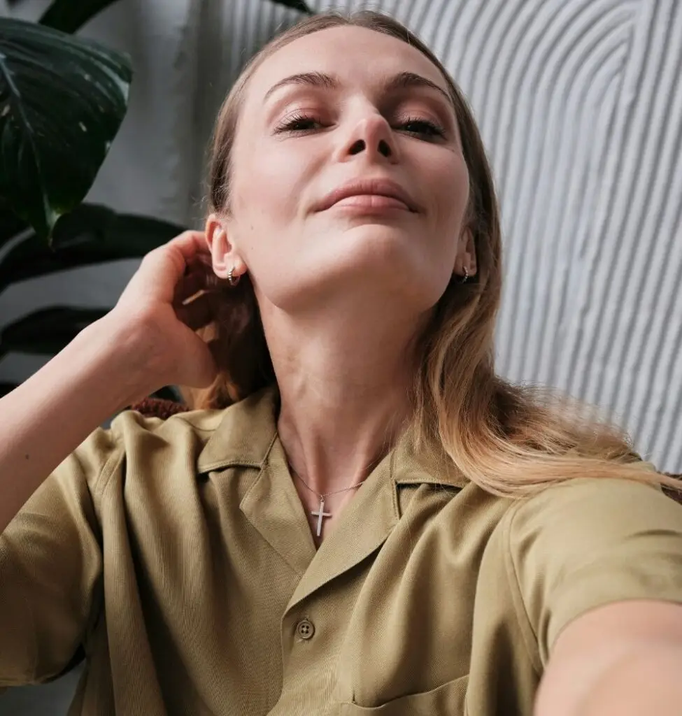 empower-your-spirit-bible verses young blonde woman confident selfies with cross necklace