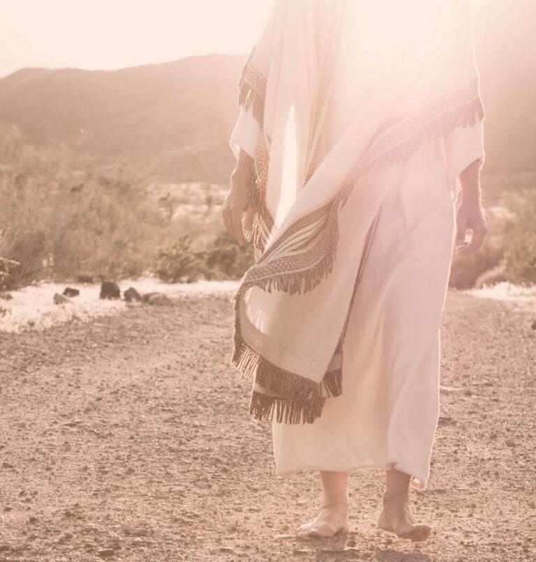Man in Jesus robe walks through desert inspired by The Chosen