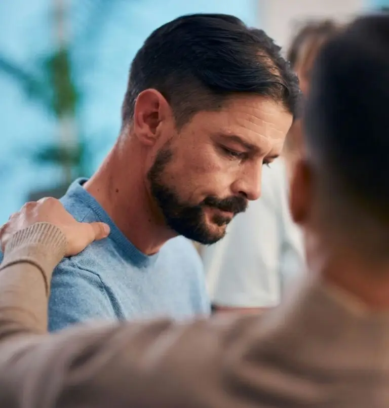 Christian man facing anxiety is counseled by friend